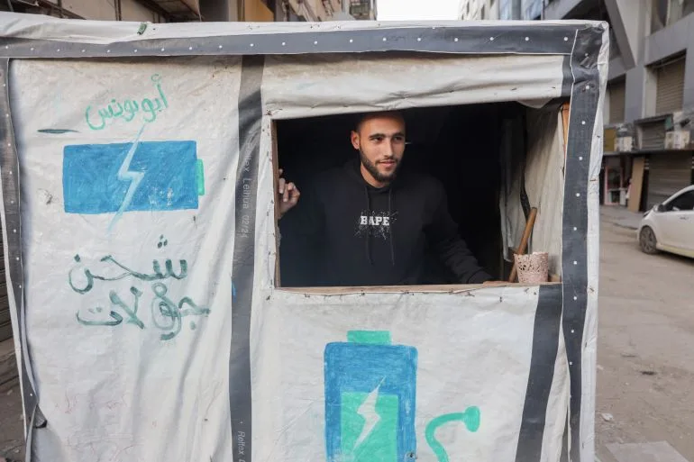 From Gallery to Charging Stations: Gaza's Economic Crisis Alters Artist's Fate