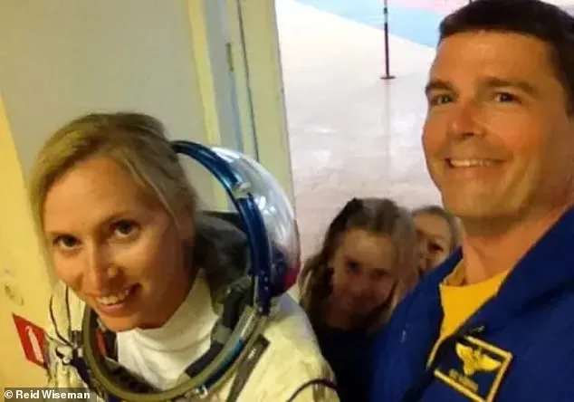 Astronauts honor fallen crewmate's wife by naming lunar crater Carroll.