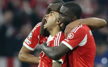 Gunners edge past Sporting in tense affair.