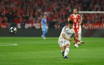Gunners edge past Sporting in tense affair.